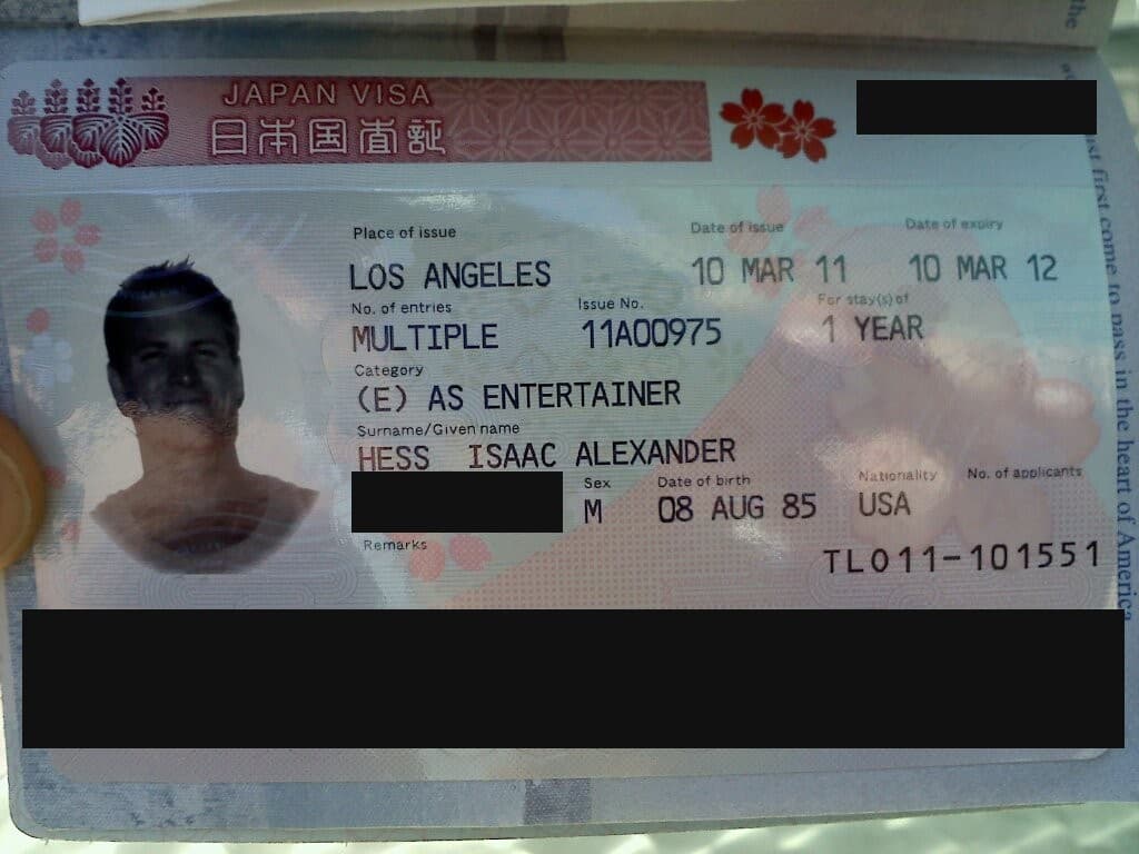 The Japanese entertainer visa issued to Isaac Hess in Los Angeles on 10 March 2011, with the passport number and machine-readable rows redacted