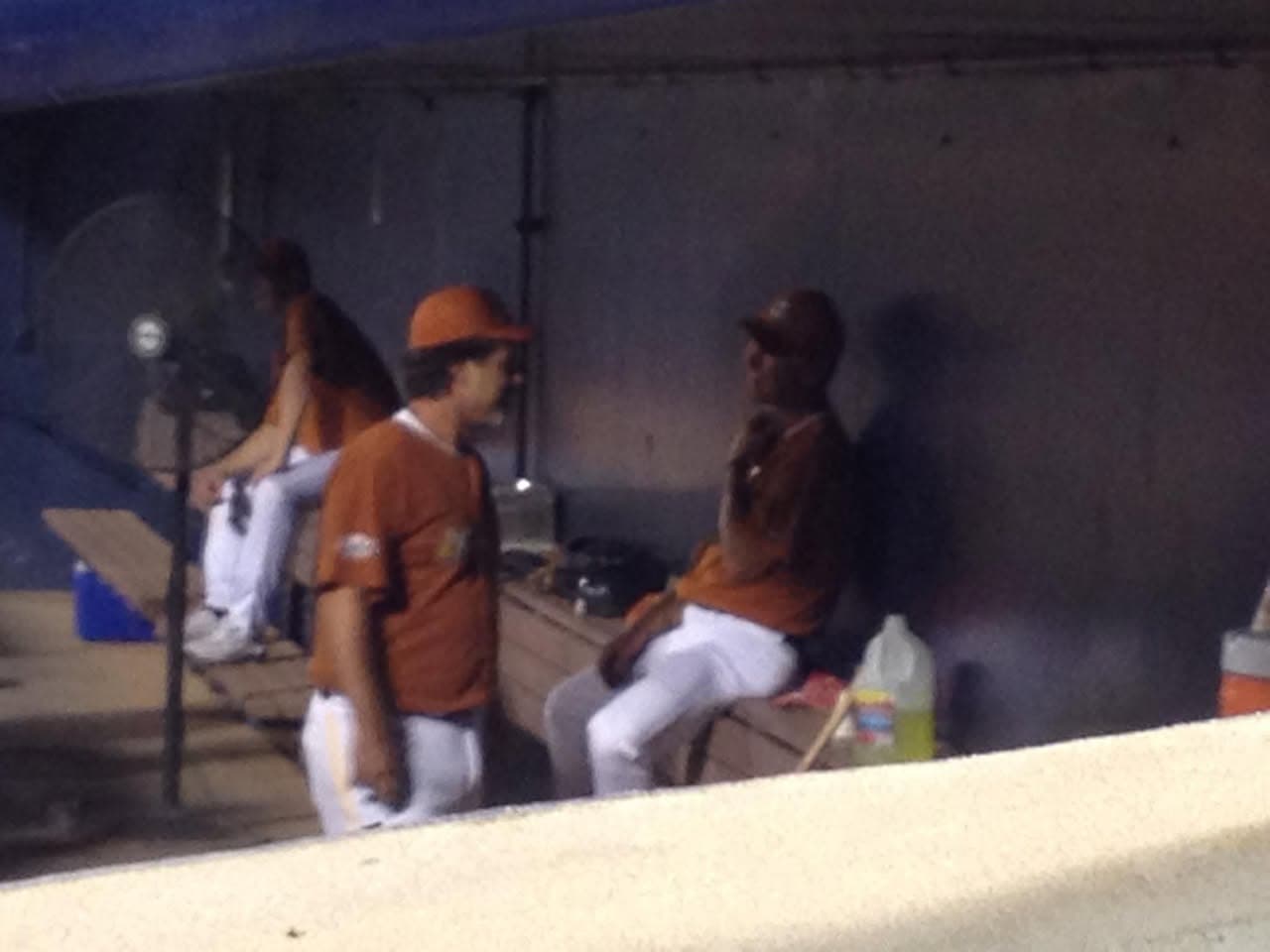Tom Novak standing in the dugout beside Bob Larson, Peoria, September 2012